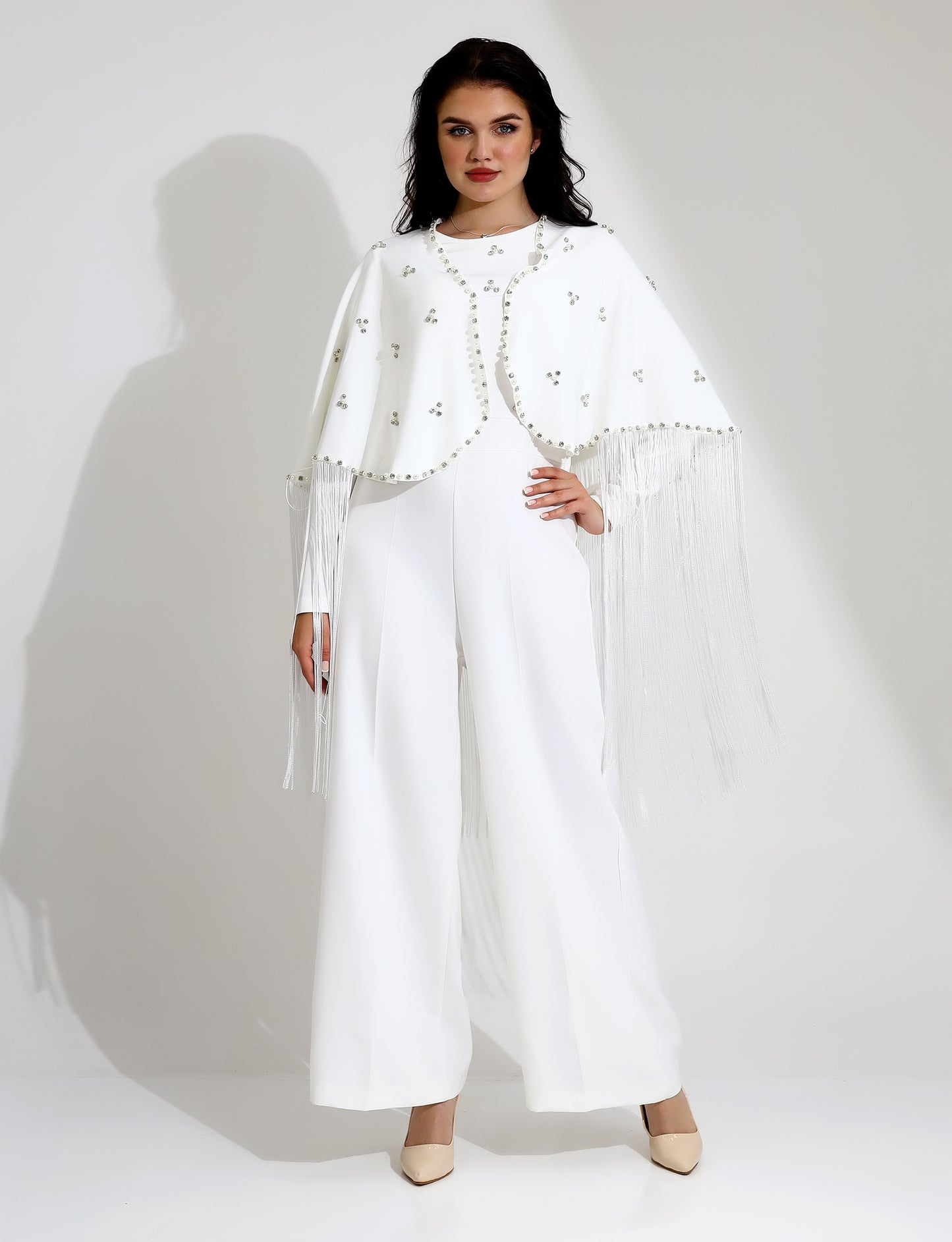 Elegant White Jumpsuit with Embellished Cape