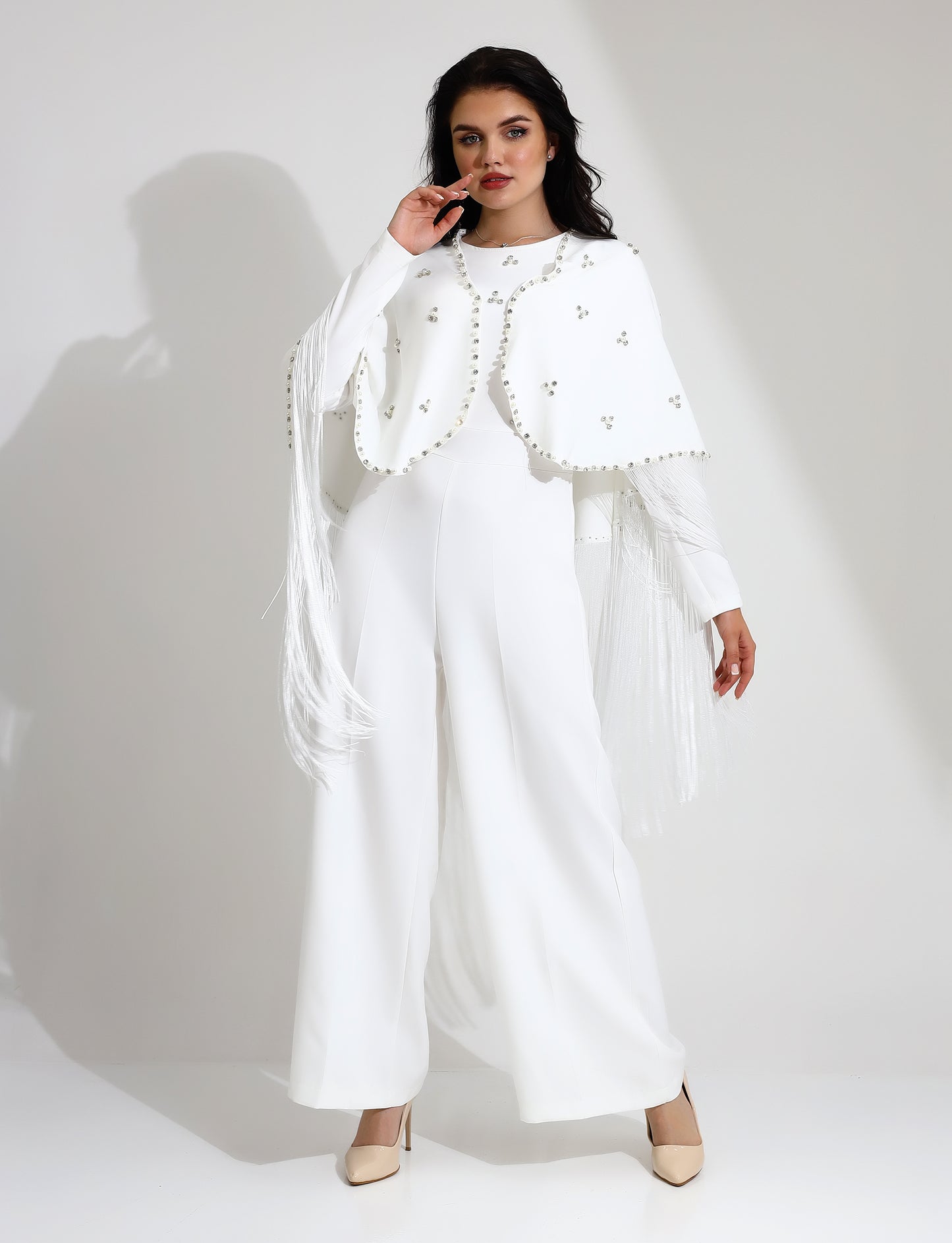 Elegant White Jumpsuit with Embellished Cape