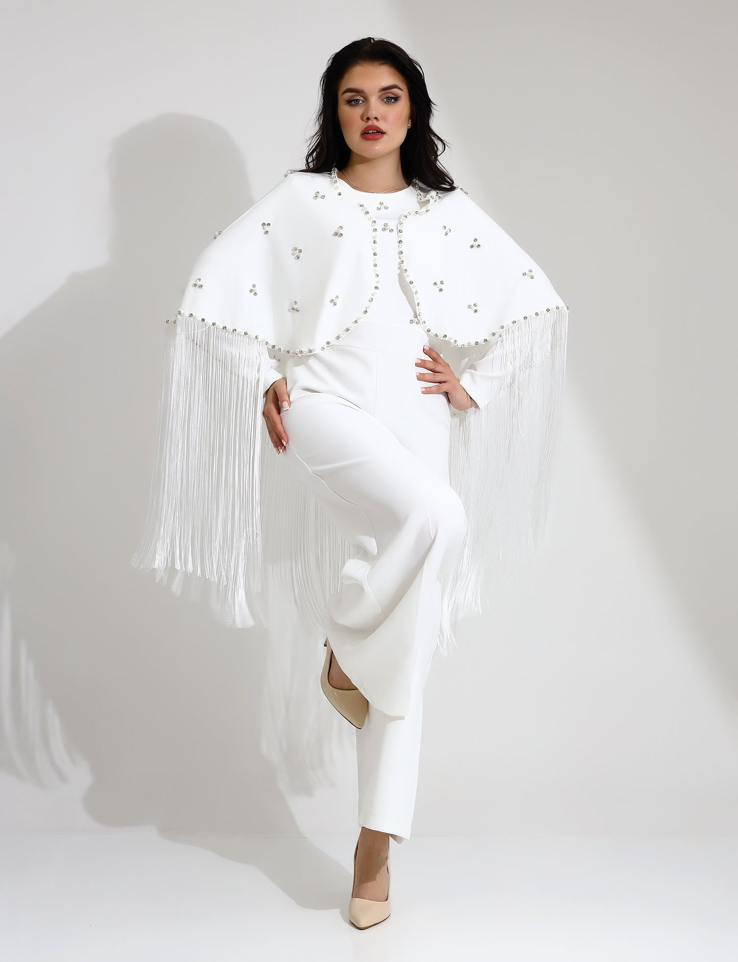 Elegant White Jumpsuit with Embellished Cape