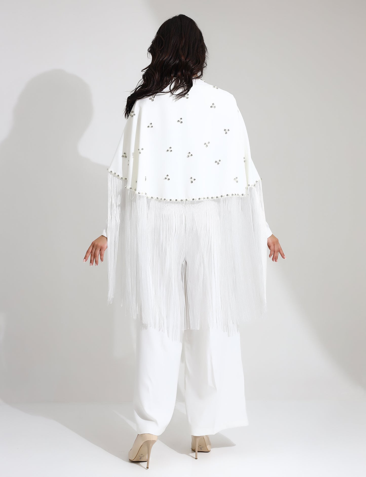 Elegant White Jumpsuit with Embellished Cape